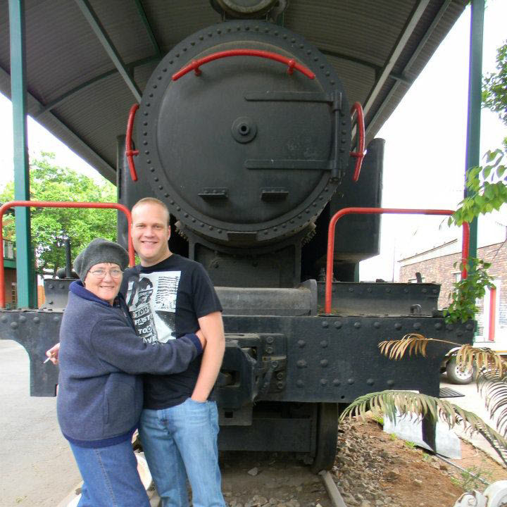 My son and I in front of the old steam locomotive at Oudewerf, Meyerton in 2011.