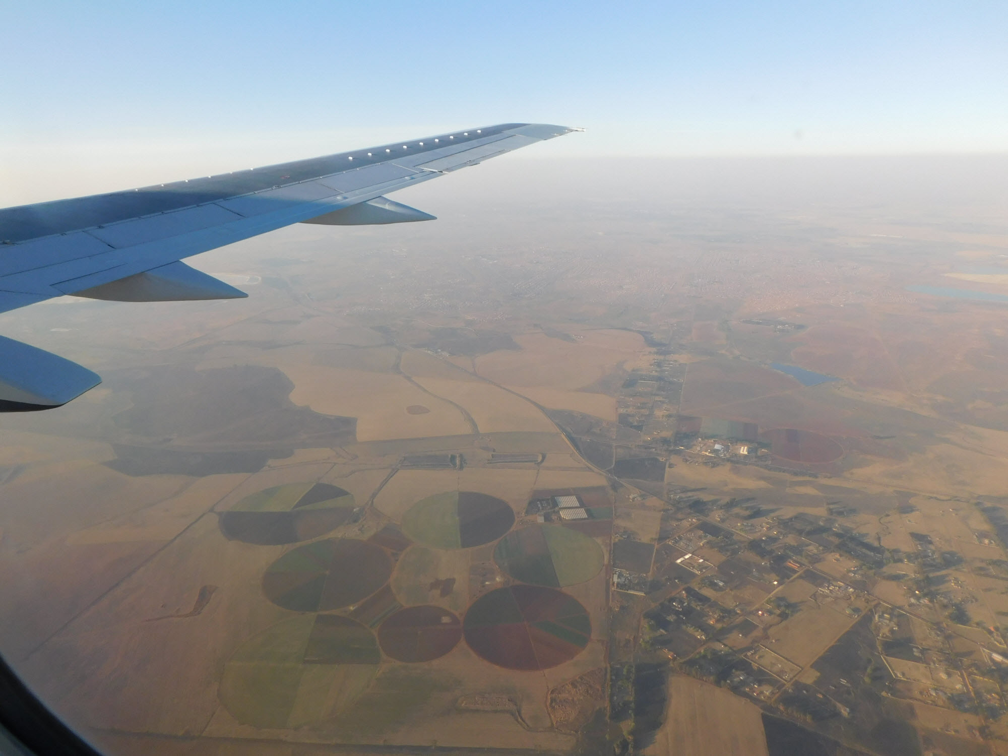 View from an airplane of Gauteng landscape ten minutes to touchdown at OR Tambo Airport, Johannesburg