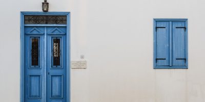 White walls with blue door and windowframe