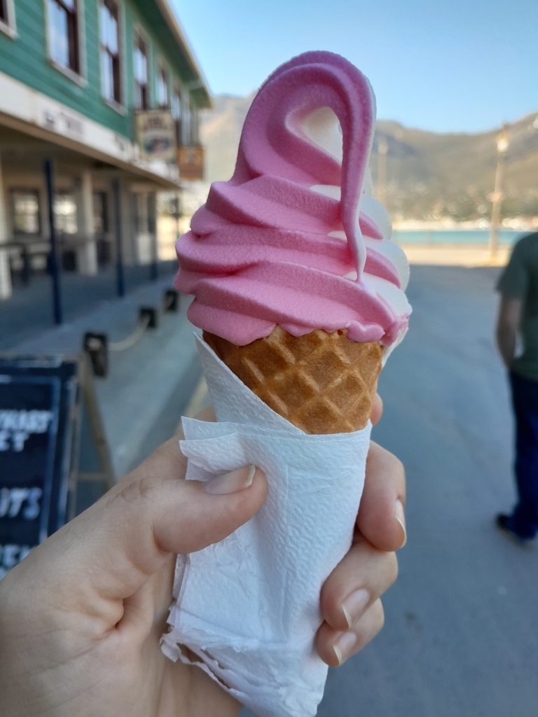 Pink ice cream in sugar cone at HoutBay Harbour, Cape Town